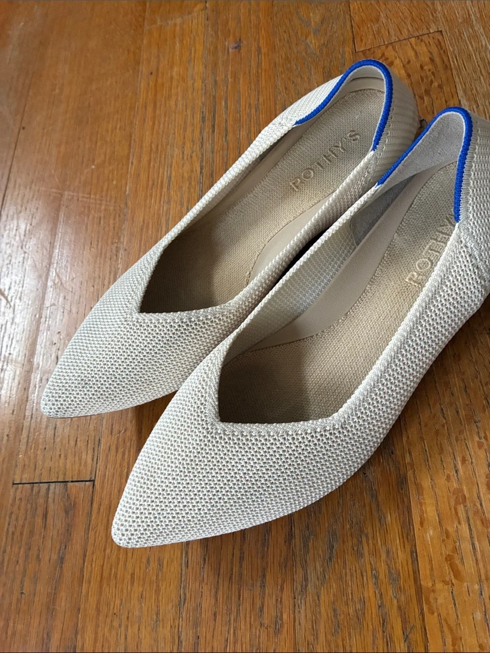 Rothy's Pointed Knit Flats in Cream with Blue Trim